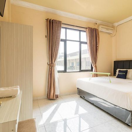 Urbanview Hotel Nugraha Palembang By Reddoorz Exterior foto